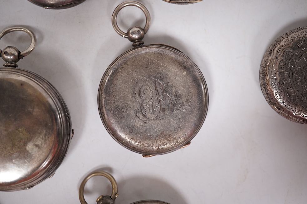 Three early to mid 20th century silver open faced pocket watches, with Roman or Arabic dials and subsidiary seconds, including two keyless and one key wind (Admiral Tacy Watch Co), together with one smaller silver open f